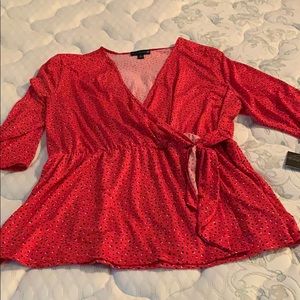 Ryan Wythe faux wrap peplum top.